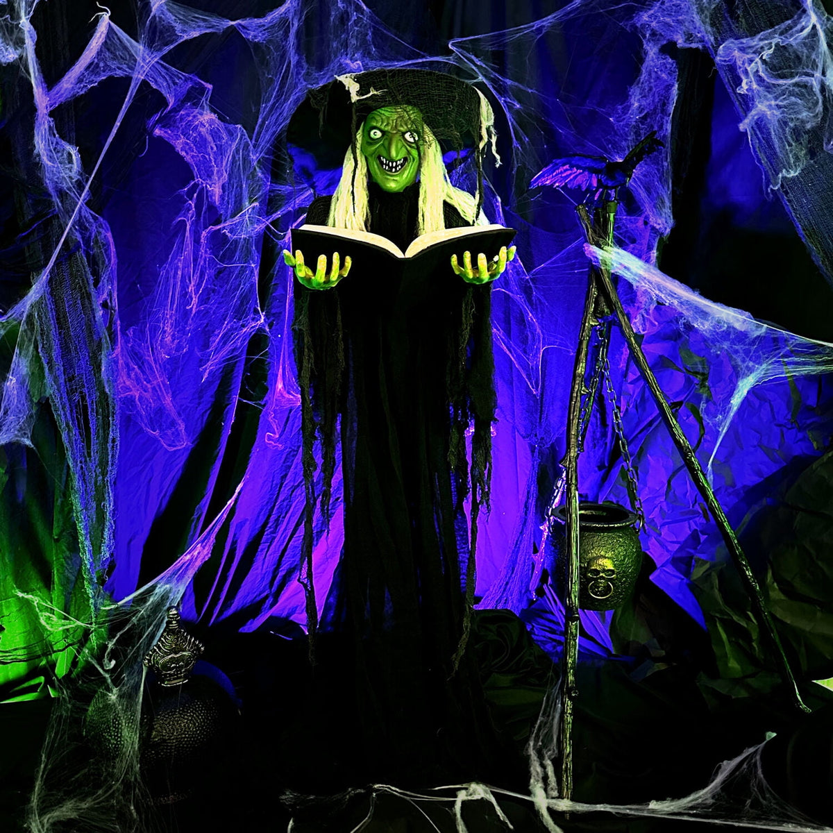 Haunt & Co 5.5 ft Poseable Witch with Spell Book, Lights and Sound, Indoor/Covered Outdoor