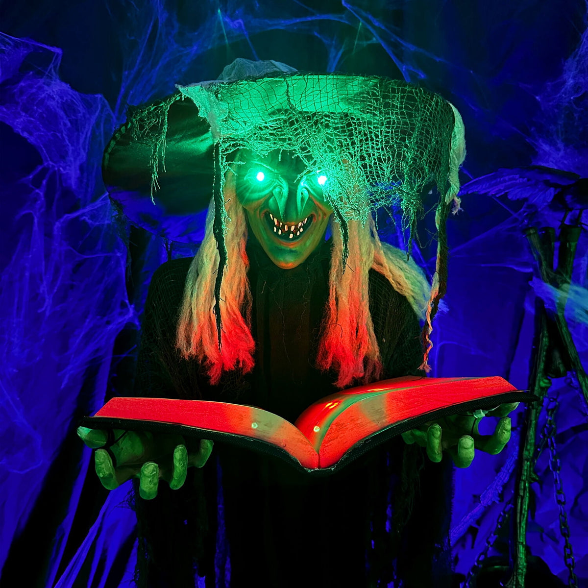 Haunt & Co 5.5 ft Poseable Witch with Spell Book, Lights and Sound, Indoor/Covered Outdoor