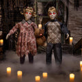Haunt & Co 3 Ft. Animated Light-Up Apocalypse Twins with Stuffed Bear