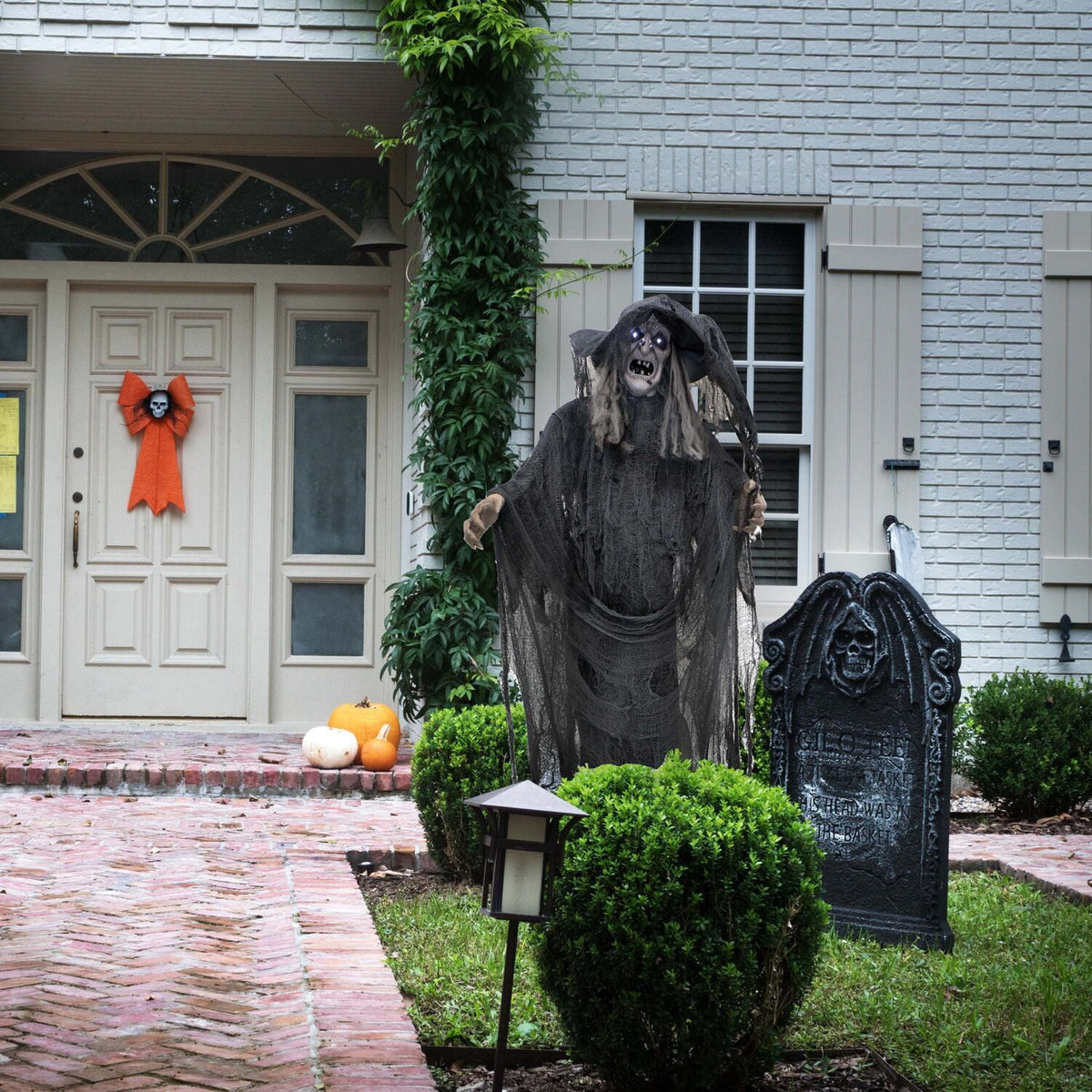 Haunt & Co 5.75 ft Animatronic Witch Indoor/Covered Outdoor