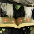 Haunt & Co 5.5 ft Poseable Witch with Spell Book, Lights and Sound, Indoor/Covered Outdoor